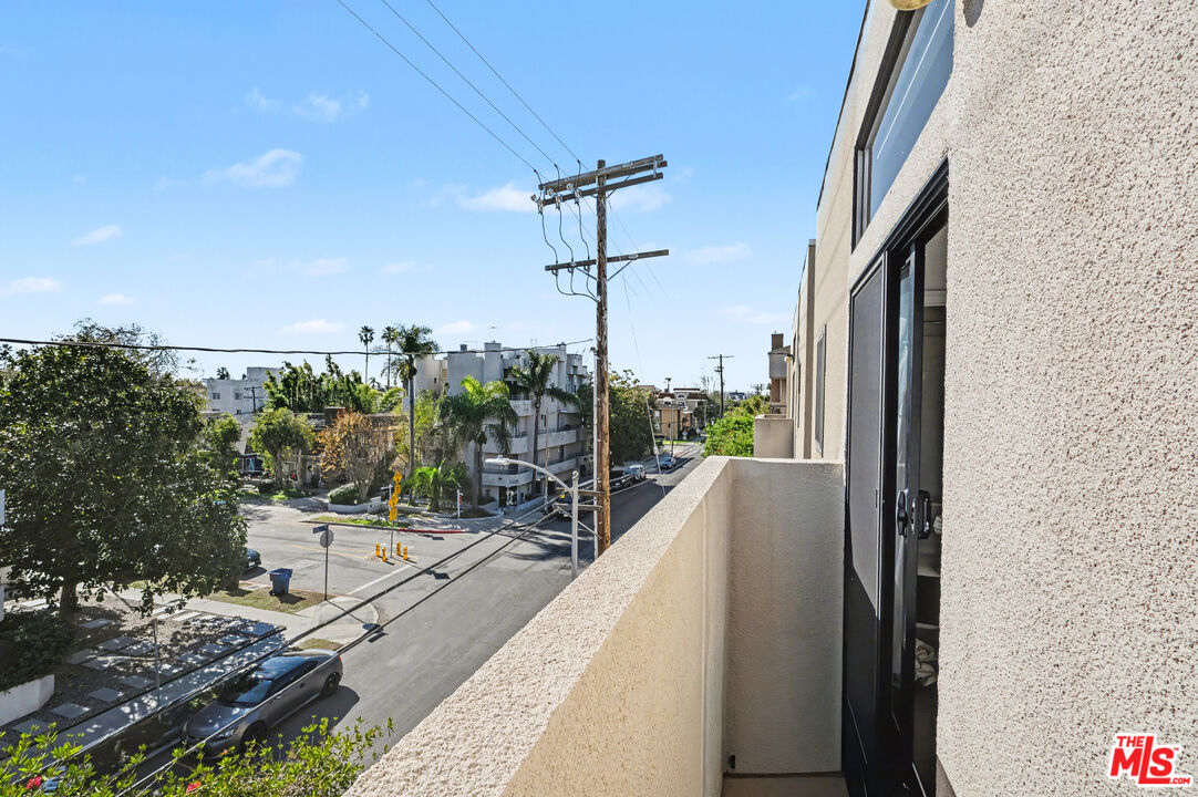 9917 Tabor Street, Unit 2 Los Angeles, CA 90034 - Photo 26 of 38 a view of balcony with furniture