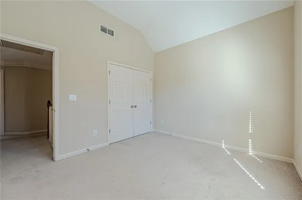 a view of balcony with wooden floor and fence