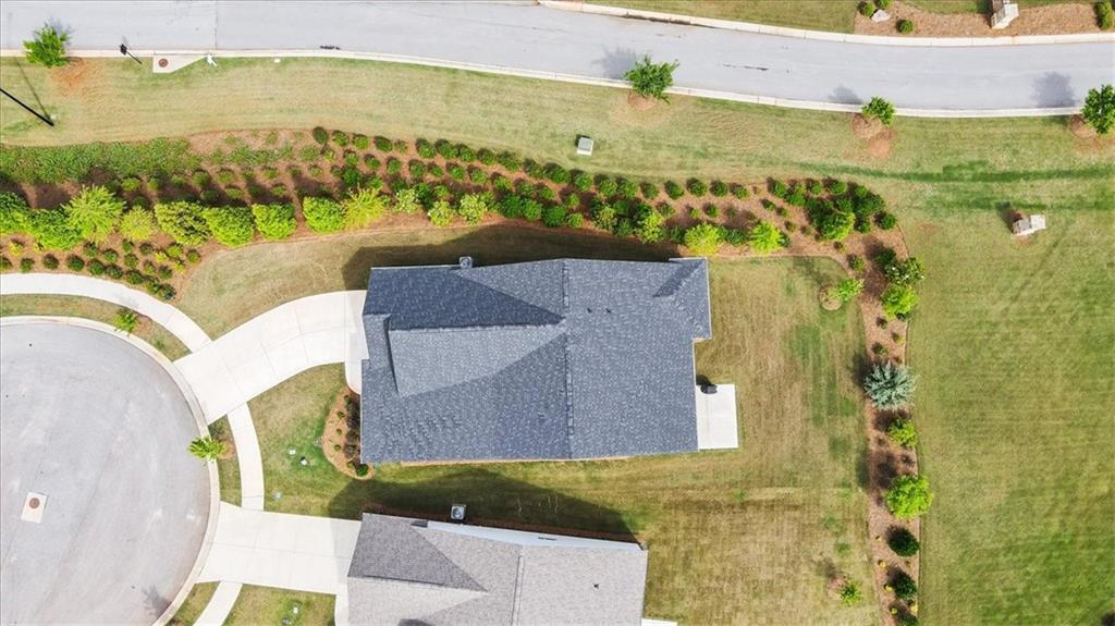 2457 Naples Street Hoschton, GA 30548 - Photo 39 of 41 an aerial view of residential houses with outdoor space