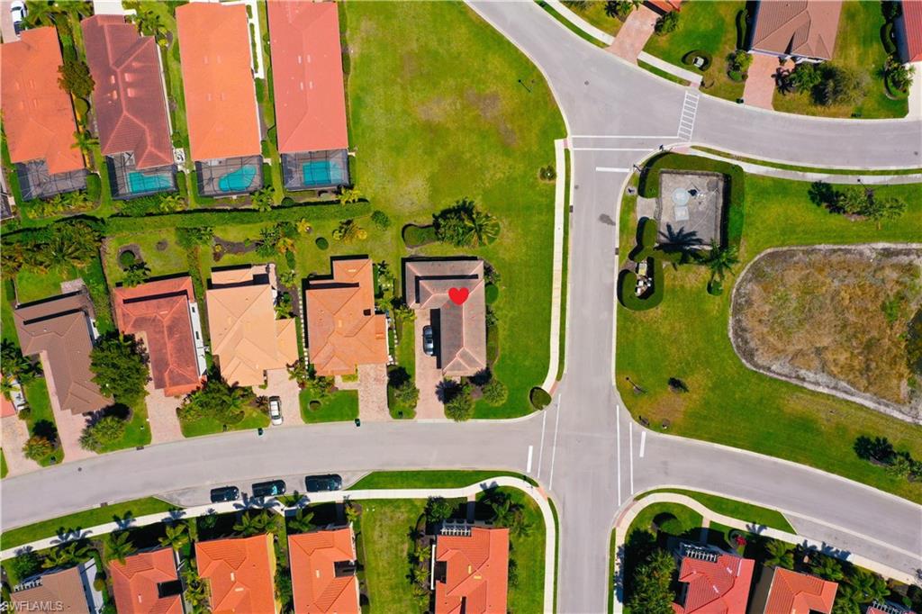 1307 Kendari Terrace Naples, FL 34113 - Photo 11 of 45 Aerial overview of property's location with nearby suburban area