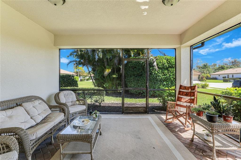 1307 Kendari Terrace Naples, FL 34113 - Photo 29 of 45 Sunroom / solarium with outdoor lounge area