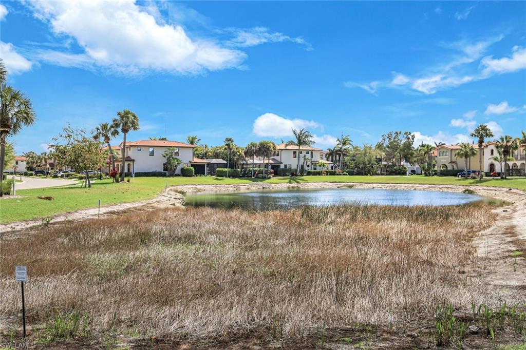 1307 Kendari Terrace Naples, FL 34113 - Photo 32 of 45 Water view with nearby suburban area