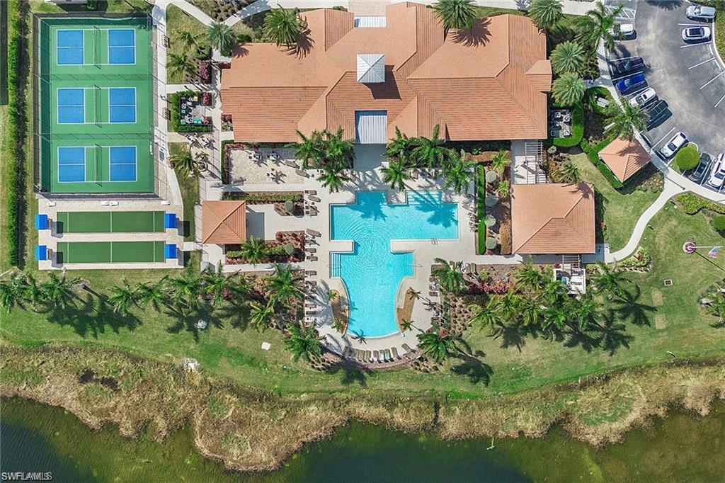 1307 Kendari Terrace Naples, FL 34113 - Photo 33 of 45 Aerial view of a pool