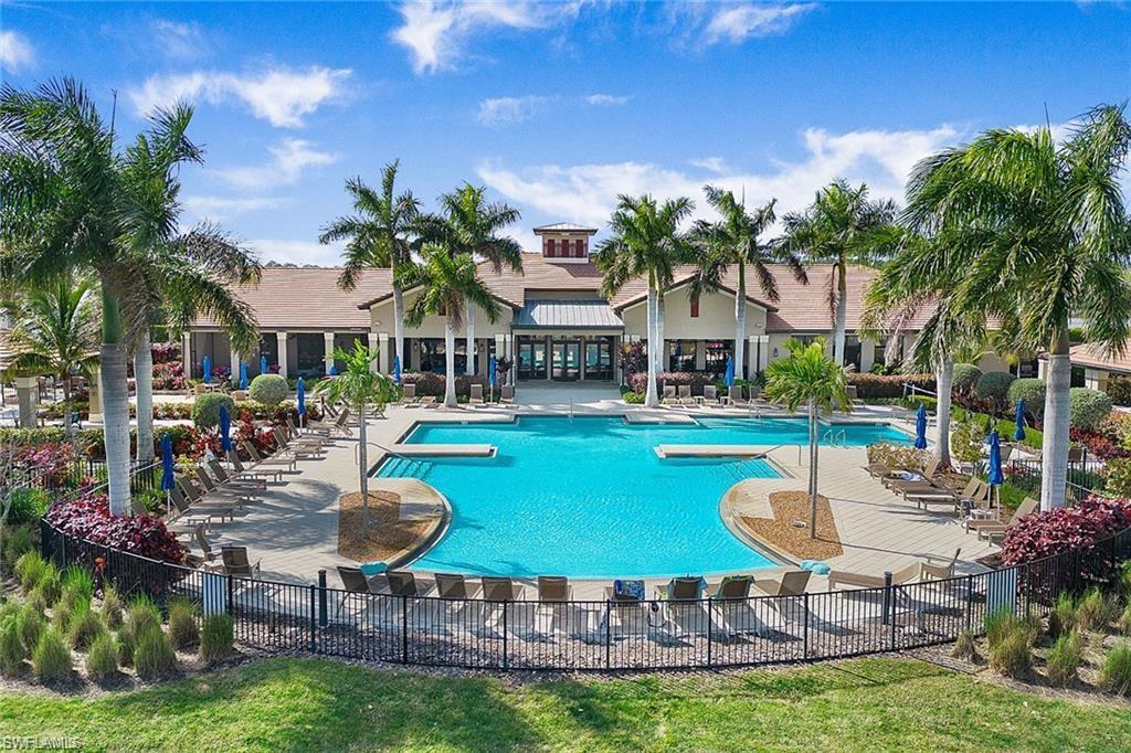 1307 Kendari Terrace Naples, FL 34113 - Photo 34 of 45 Community pool with a patio area