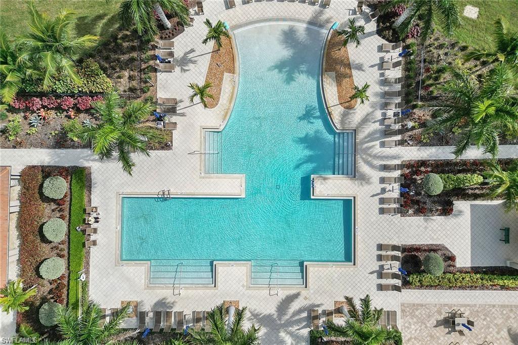 1307 Kendari Terrace Naples, FL 34113 - Photo 35 of 45 Bird's eye view of a pool area
