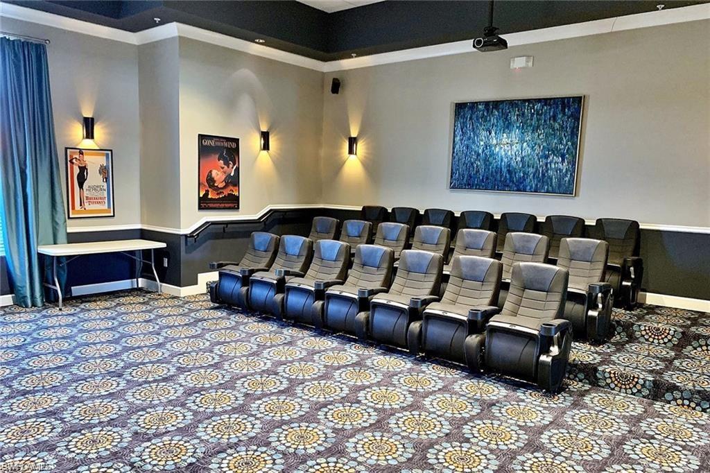 1307 Kendari Terrace Naples, FL 34113 - Photo 38 of 45 Carpeted cinema room with baseboards