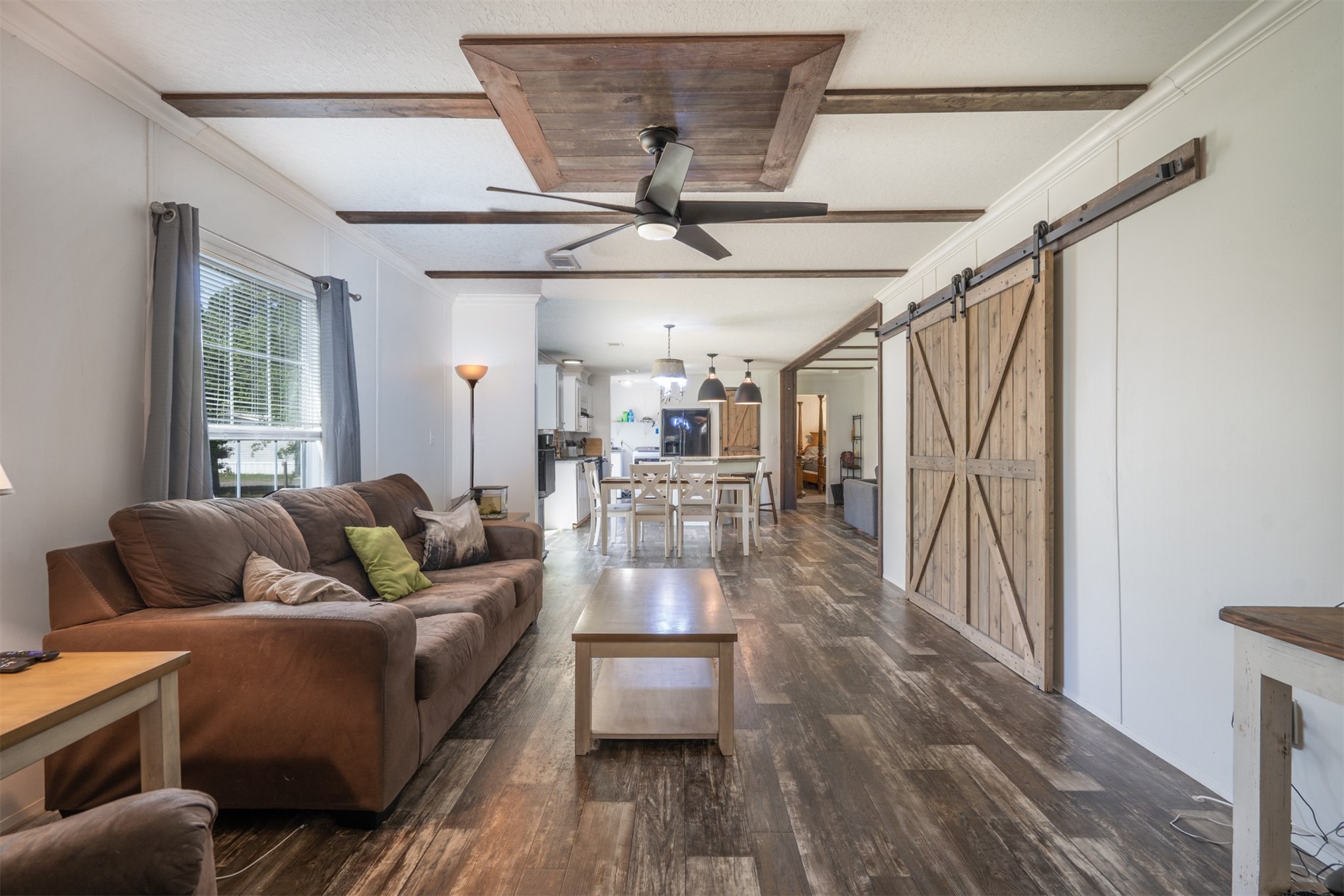 76220 Dove Road Yulee, FL 32097 - Photo 3 of 48 a living room with furniture and wooden floor