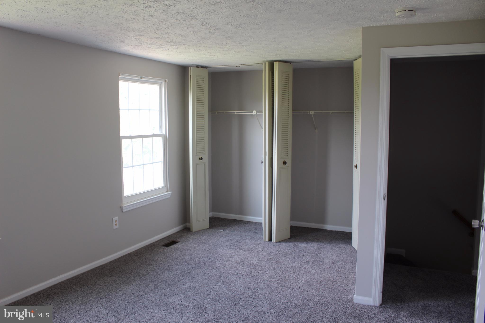 6308 Greenfield Road Elkridge, MD 21075 - Photo 11 of 14 an empty room that has a window