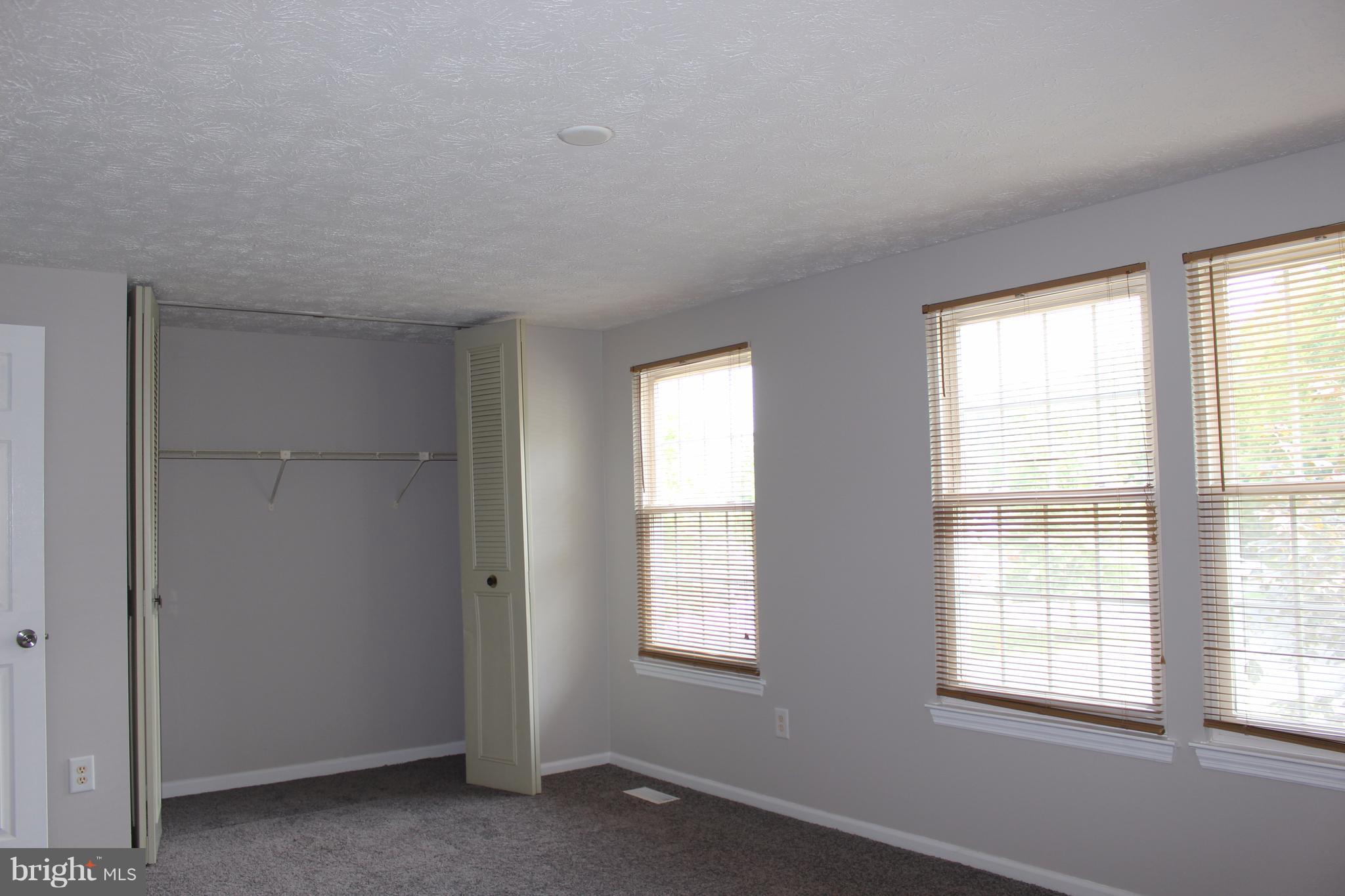 6308 Greenfield Road Elkridge, MD 21075 - Photo 14 of 14 a view of an empty room with a window