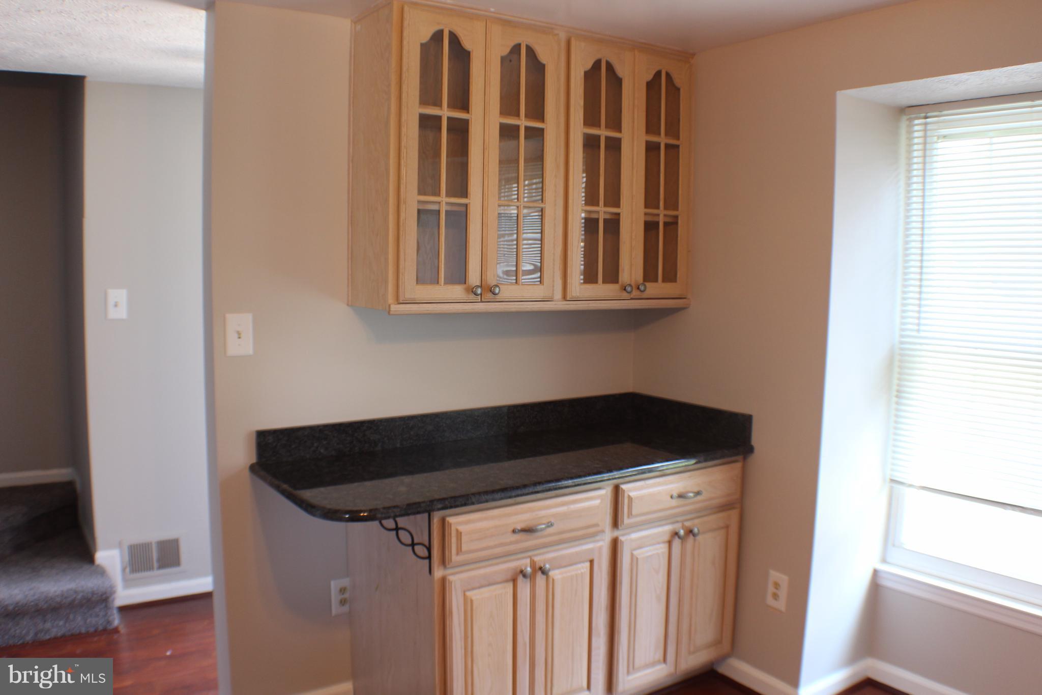 6308 Greenfield Road Elkridge, MD 21075 - Photo 4 of 14 a kitchen with a sink and cabinets