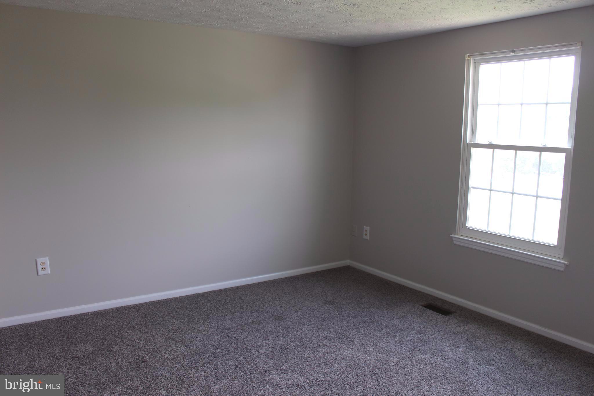 6308 Greenfield Road Elkridge, MD 21075 - Photo 10 of 14 an empty room with a window
