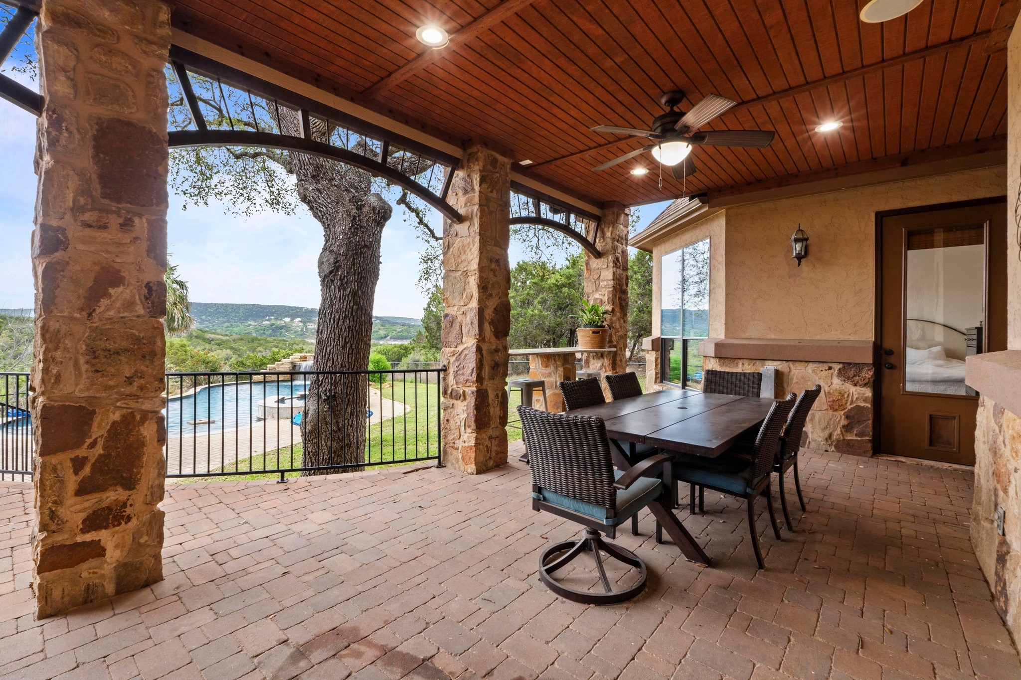 8211 Moon Rise Trail Jonestown, TX 78645 - Photo 23 of 34 Dining poolside. This outdoor oasis is an entertainers dream space. The patio also includes a built in bbq, and bar top dining area.