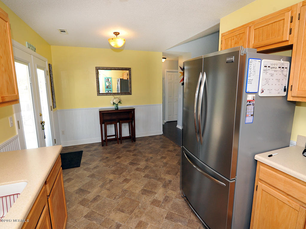 3100 Reminisce Road Castle Hayne, NC 28429 - Photo 10 of 28 Kitchen and Dining