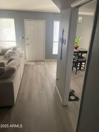 a view of livingroom with furniture and windows