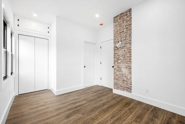 a view of livingroom with hardwood floor and window
