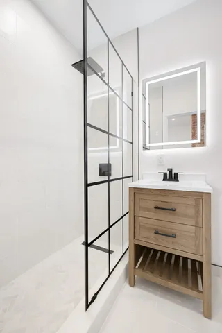 a bathroom with a sink and a mirror