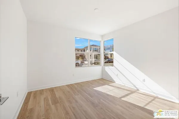 a bathroom with a sink a vanity and a mirror