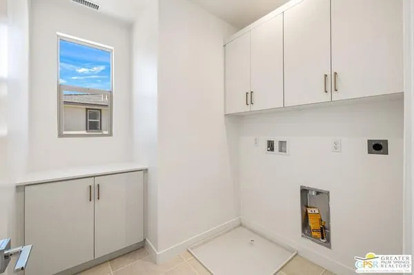 an aerial view of a house with a swimming pool