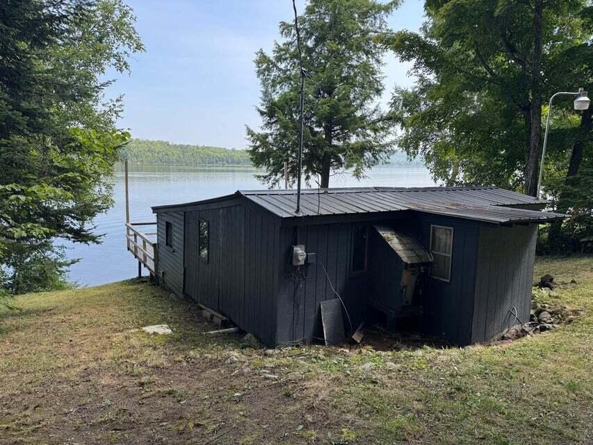 656 W Road Portage Lake, ME 04768 - Photo 7 of 24 Exterior