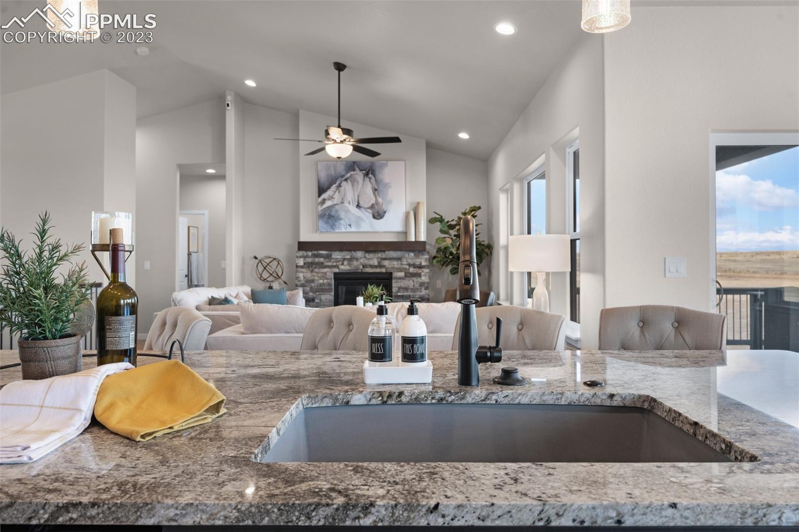 2970 Hoofprint Road Peyton, CO 80831 - Photo 12 of 42 Granite Island Top Looking Into Great Room