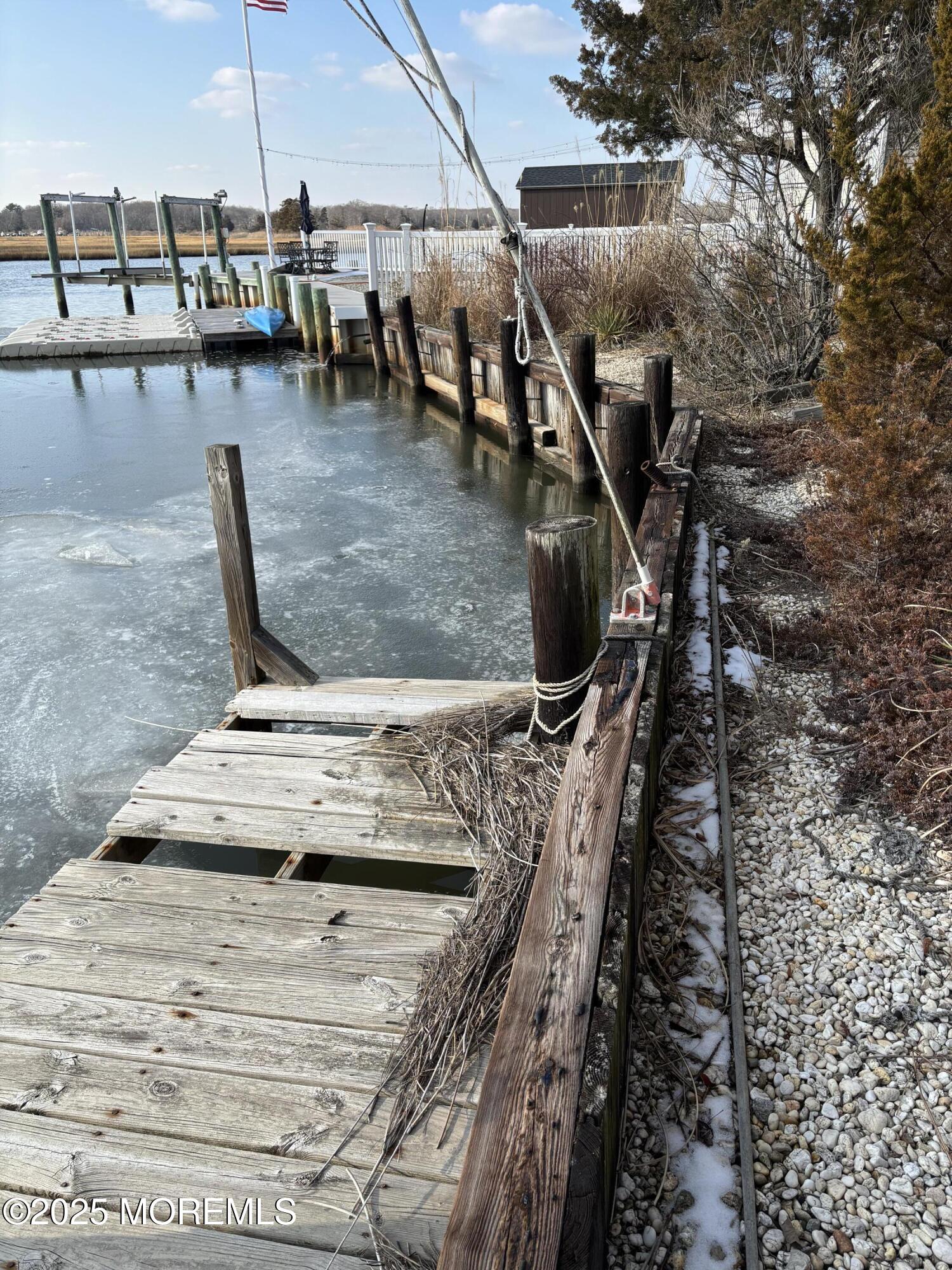 9 Bridge Road Barnegat, NJ 08005 - Photo 5 of 26 Dock and bulkhead -approx 60 ft frontage