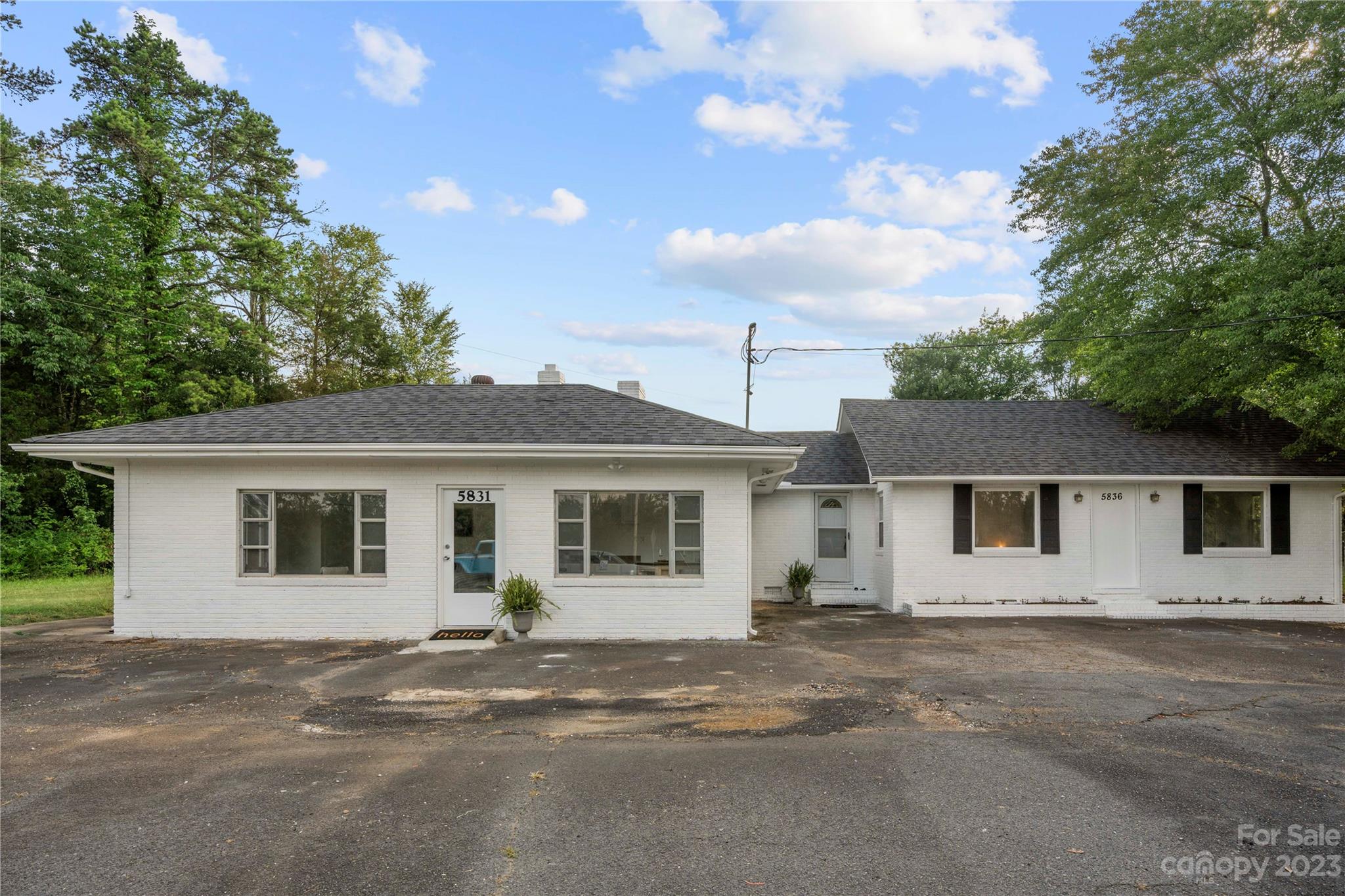 front view of a house with a street