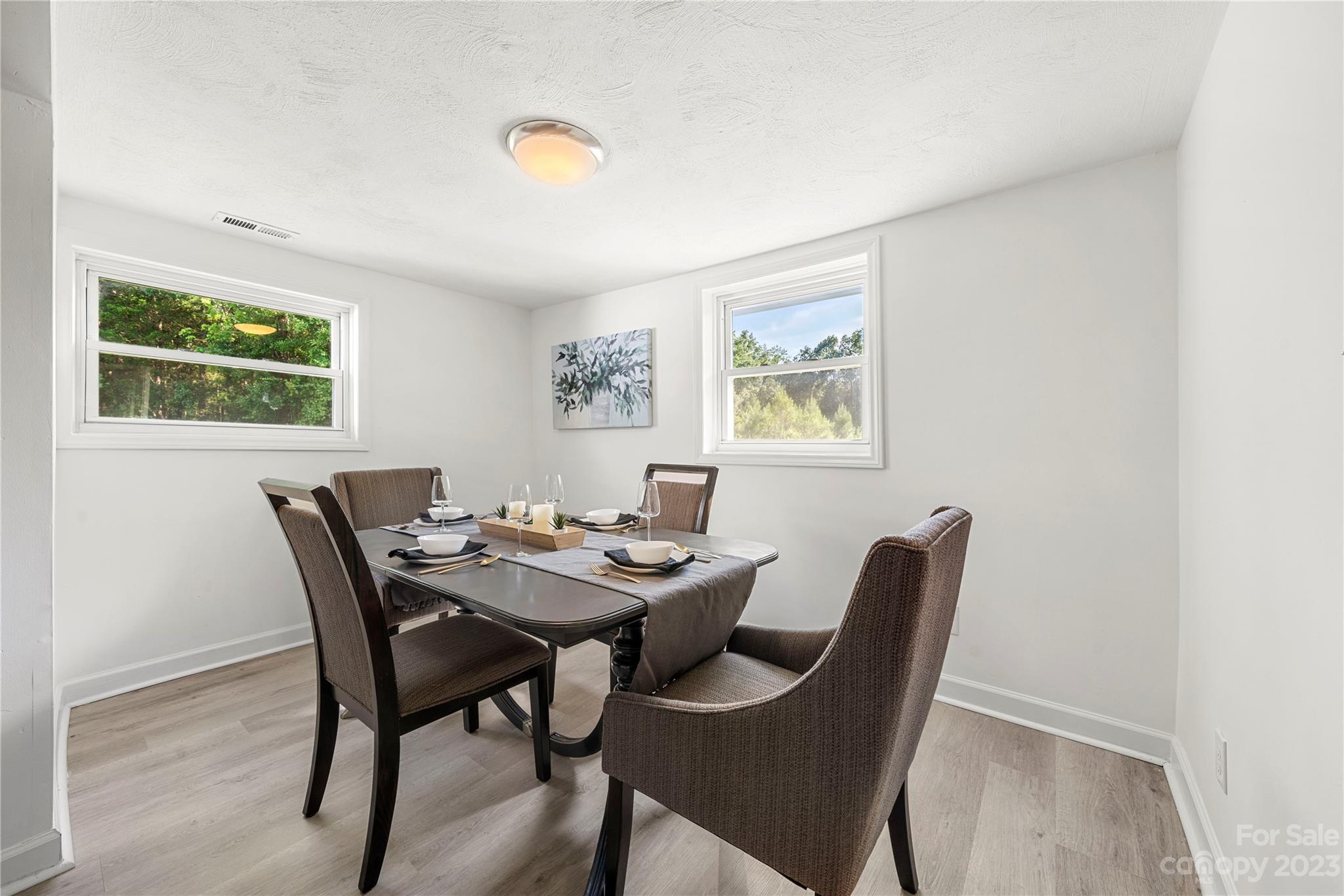 5836 Highway 601 Concord, NC 28025 - Photo 14 of 35 a view of a dining room with furniture