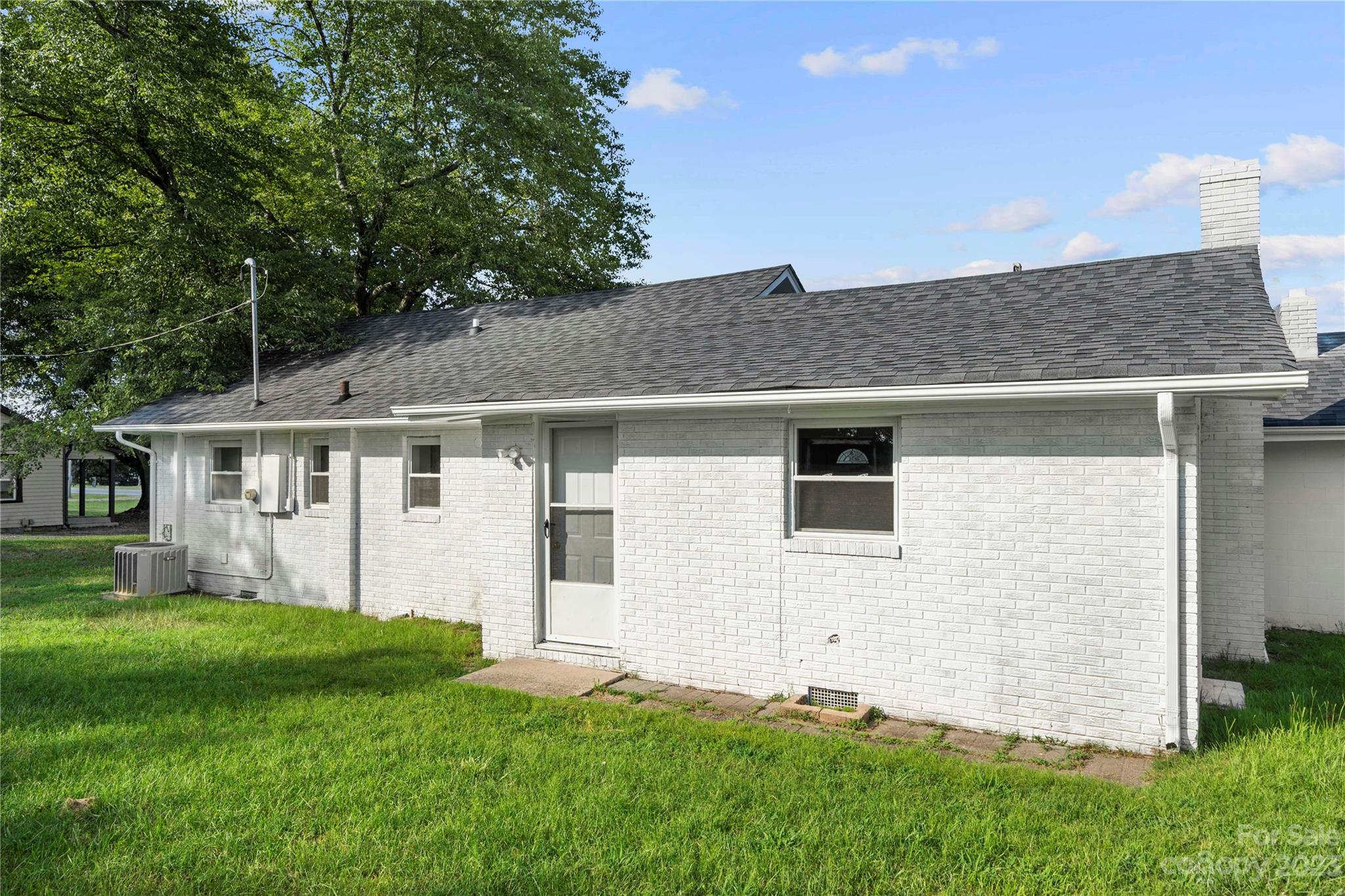 5836 Highway 601 Concord, NC 28025 - Photo 24 of 35 a front view of a house with a garden