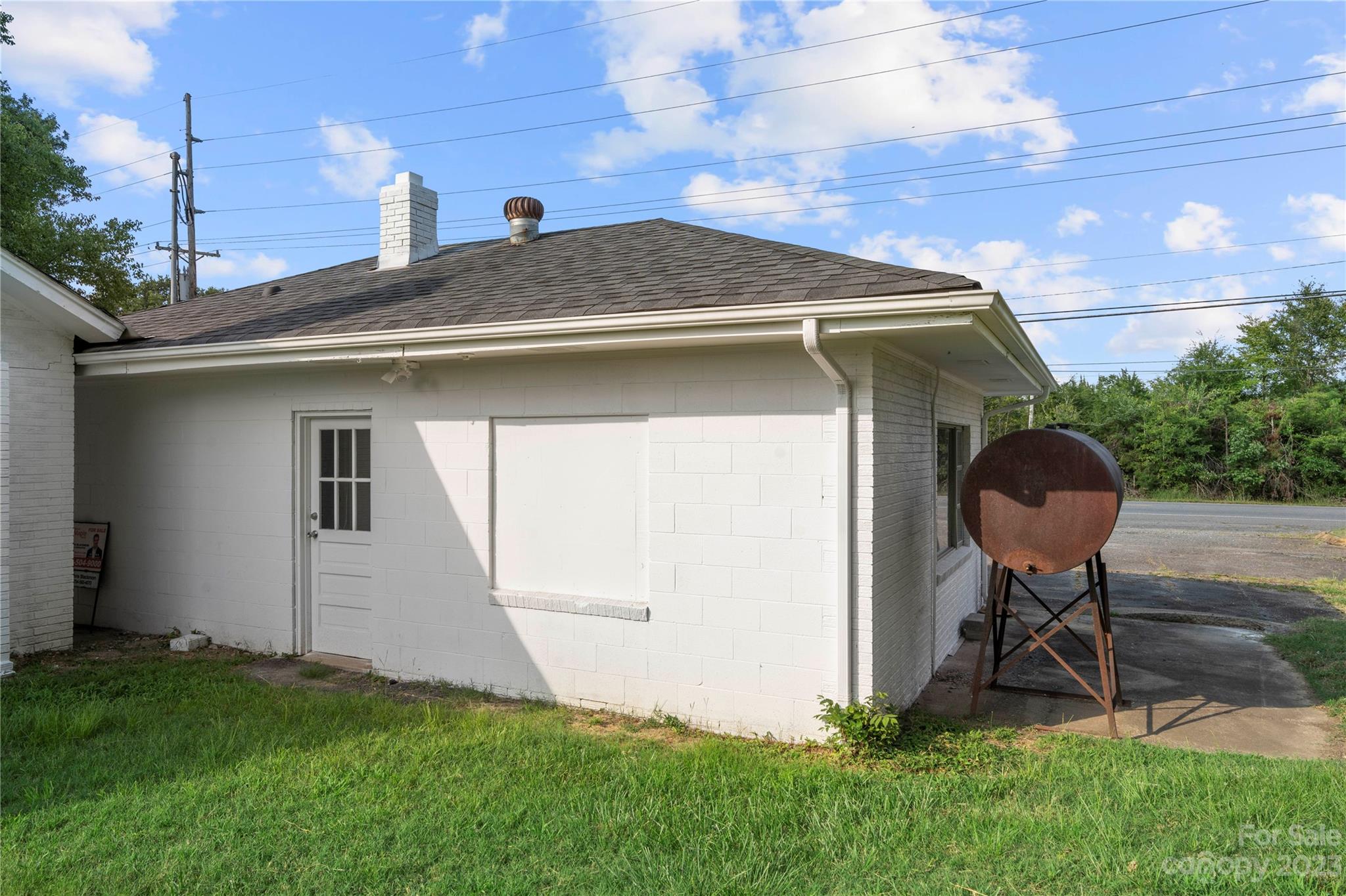 5836 Highway 601 Concord, NC 28025 - Photo 28 of 35 a front view of a house with garden