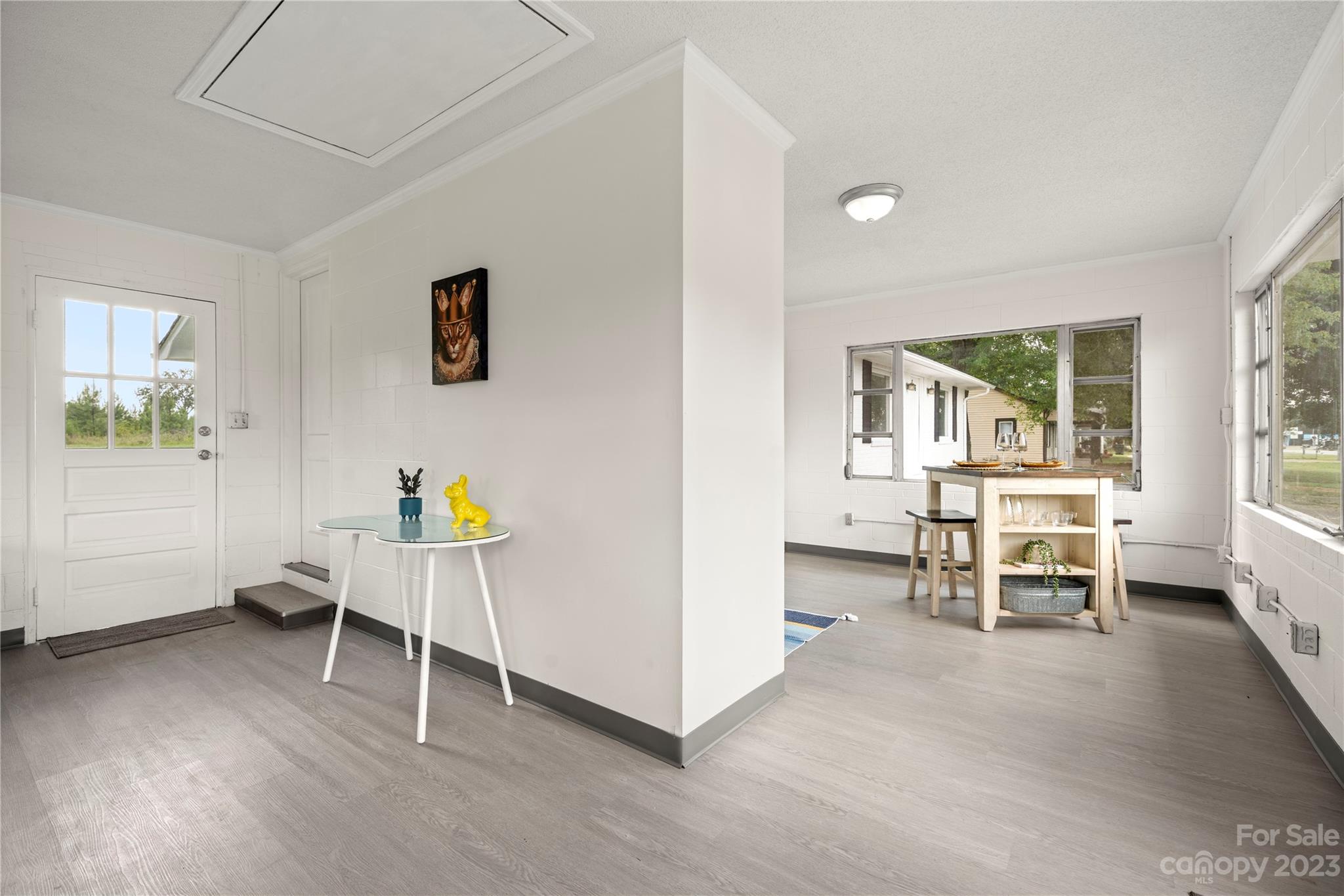 5836 Highway 601 Concord, NC 28025 - Photo 34 of 35 a living room with a table and a chair