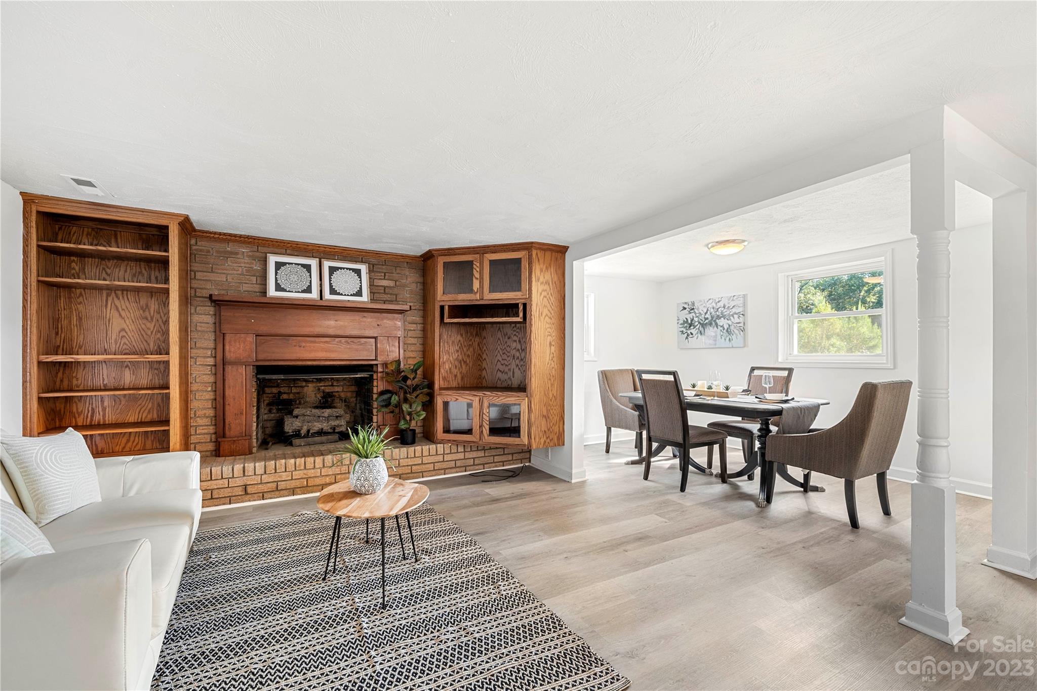5836 Highway 601 Concord, NC 28025 - Photo 5 of 35 a living room with furniture and a fireplace