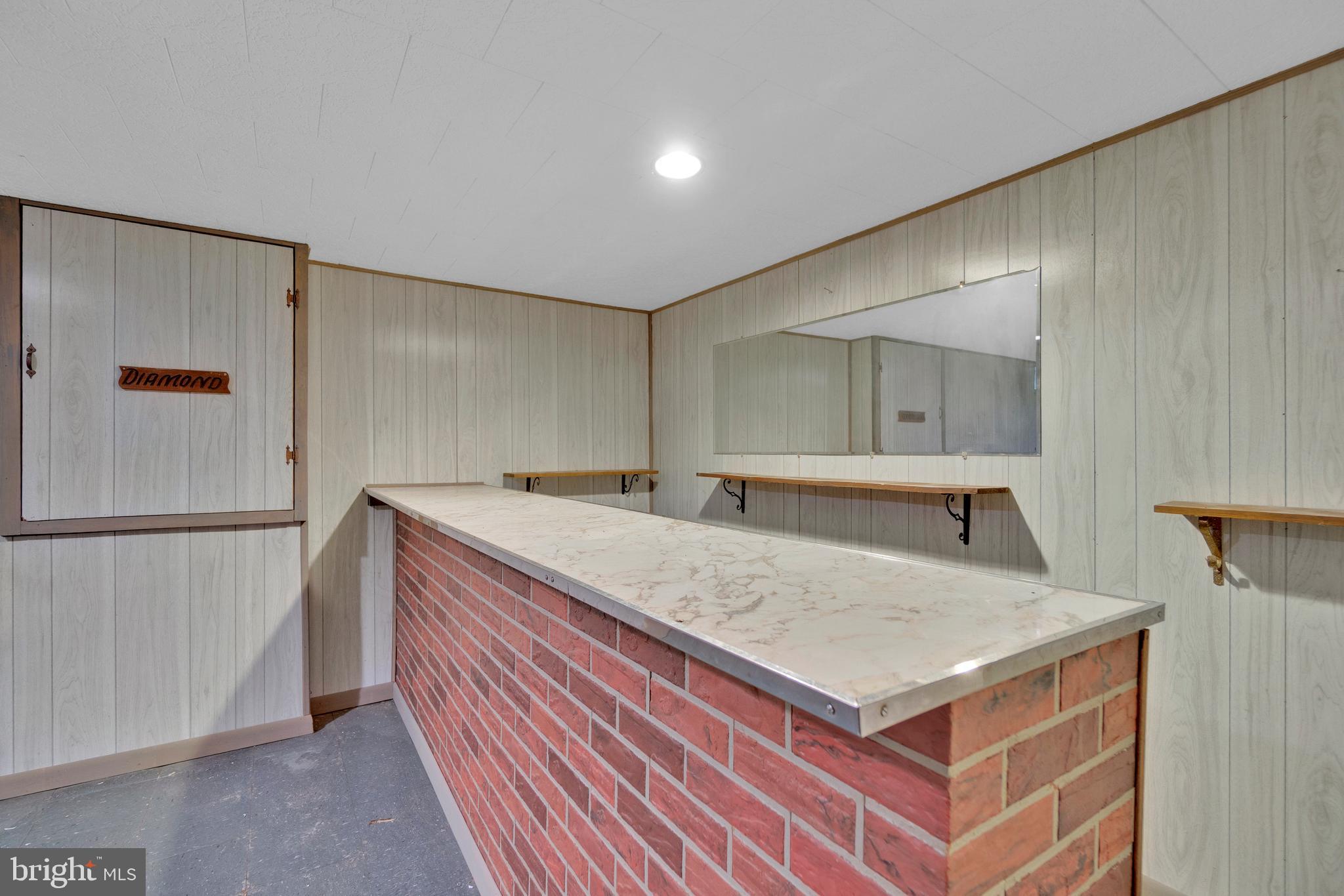 7723 Charlesmont Road Baltimore, MD 21222 - Photo 23 of 28 Basement Bar