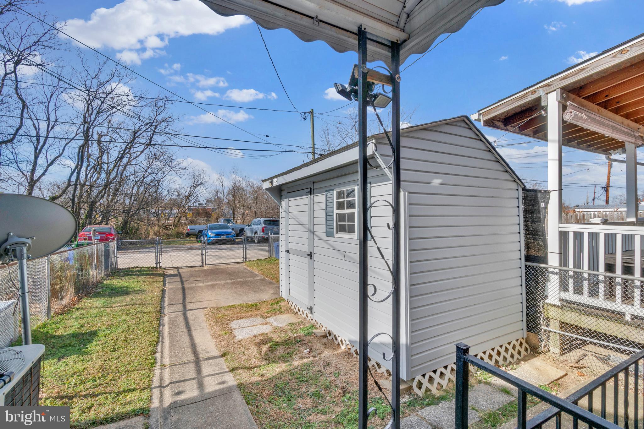 7723 Charlesmont Road Baltimore, MD 21222 - Photo 26 of 28 Fenced Rear Yard with Shed