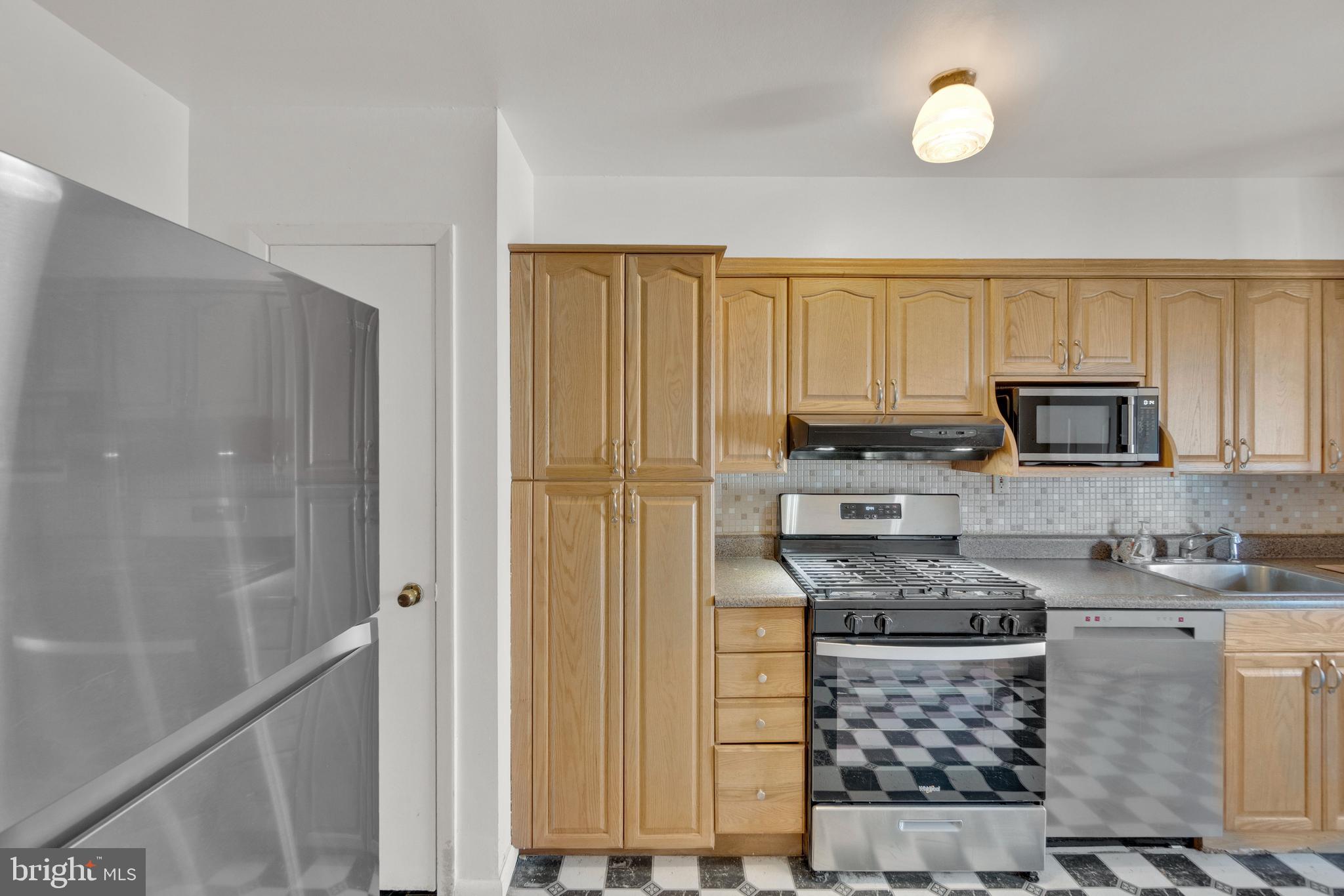 7723 Charlesmont Road Baltimore, MD 21222 - Photo 10 of 28 Kitchen with Stainless Steel Appliances