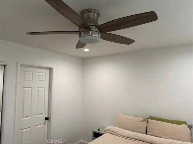 a bathroom with a shower and cabinets