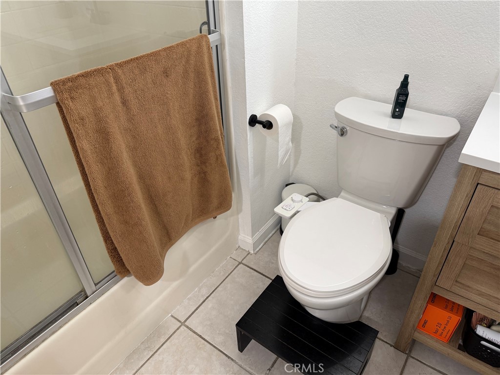 23 Pomelo Rancho Santa Margarita, CA 92688 - Photo 22 of 28 a bathroom with a toilet and a shower