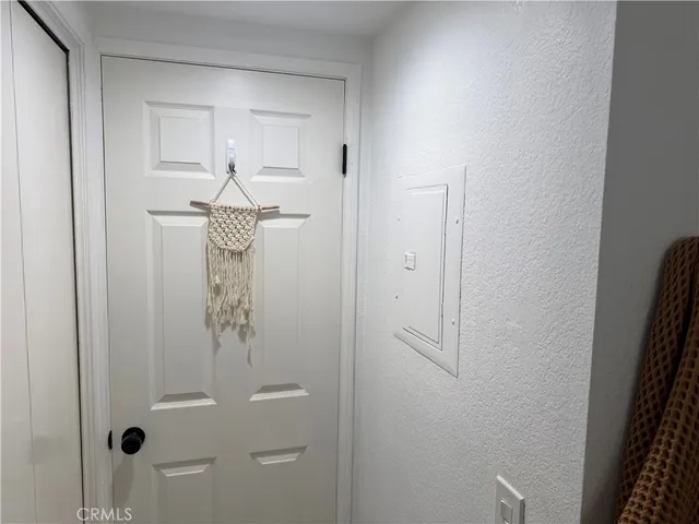 a bathroom with a glass shower door