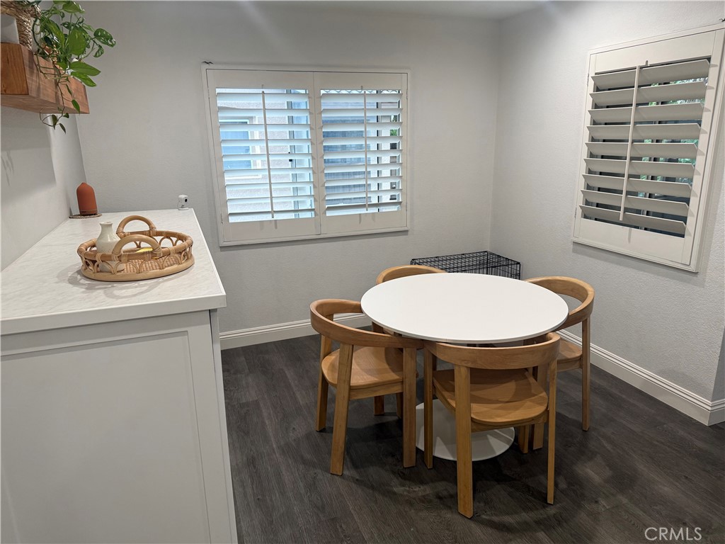 23 Pomelo Rancho Santa Margarita, CA 92688 - Photo 24 of 28 a dining room with a table and chairs
