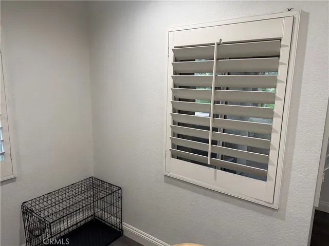 a room with a furniture and a window