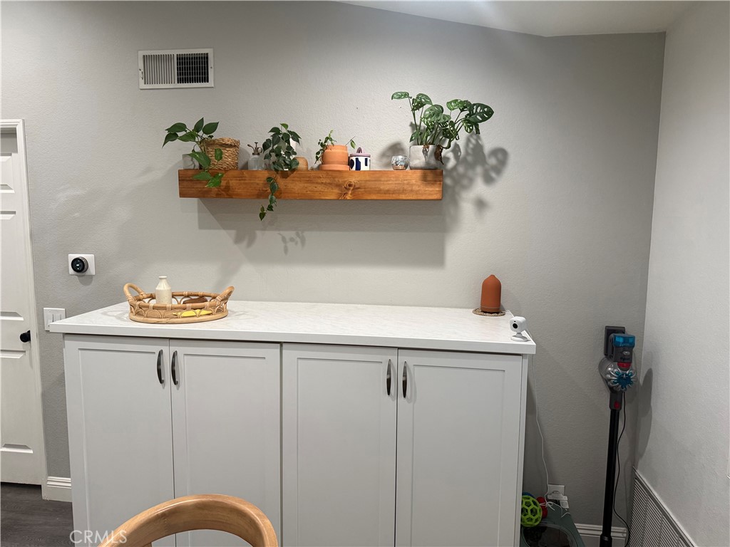 23 Pomelo Rancho Santa Margarita, CA 92688 - Photo 27 of 28 a vase of flowers sitting on a table