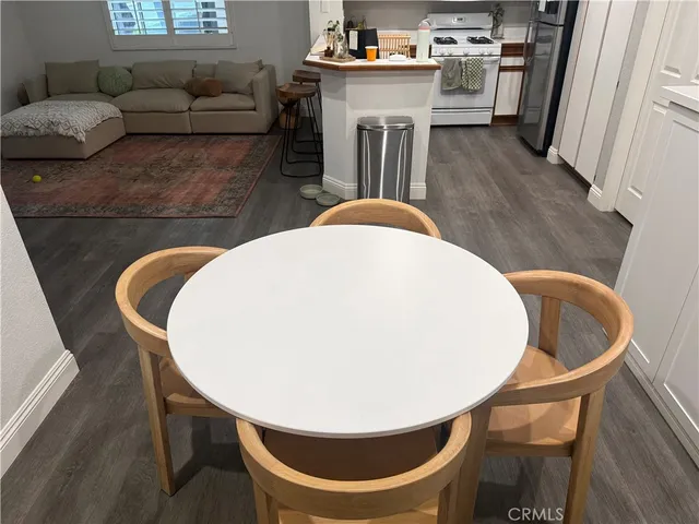 a living room with a couch and a fireplace