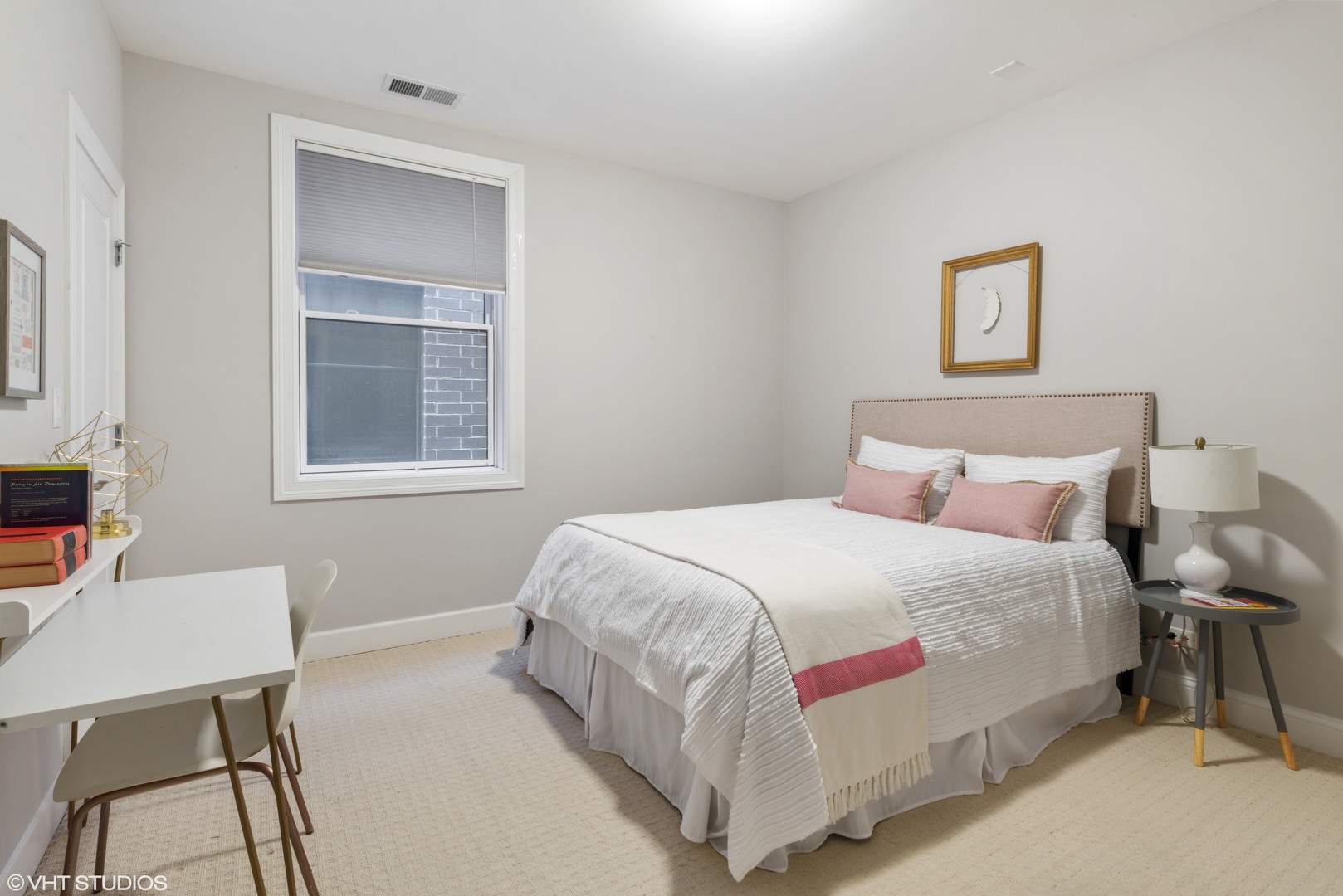 1025 West Monroe Street, Unit 3E Chicago, IL 60607 - Photo 12 of 14 a bedroom with a bed and a desk