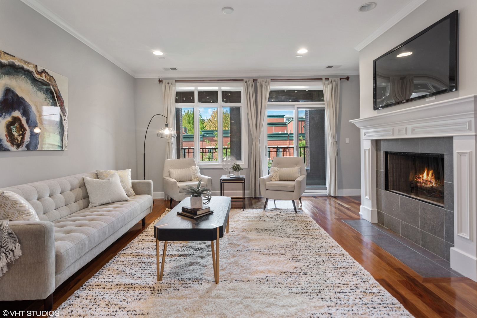1025 West Monroe Street, Unit 3E Chicago, IL 60607 - Photo 3 of 14 a living room with furniture and a fireplace