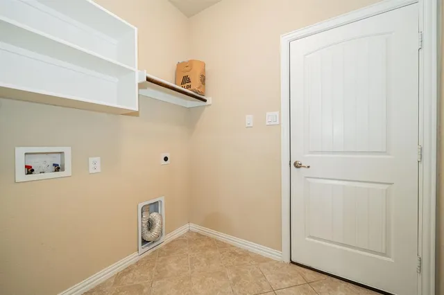 a kitchen with stainless steel appliances granite countertop a sink and a stove