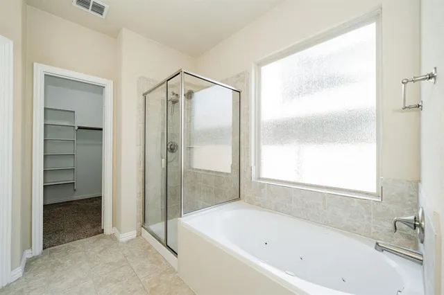 a view of a walk in closet