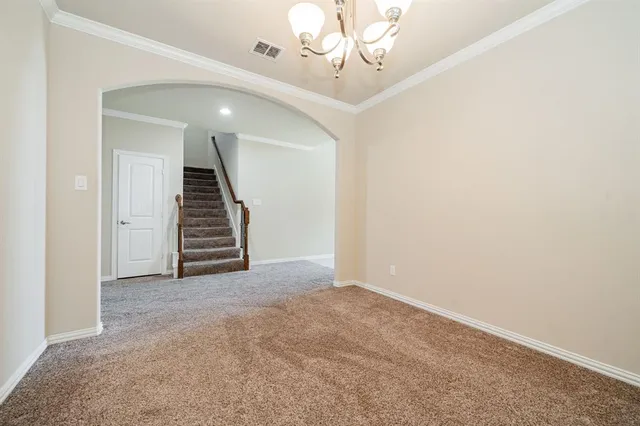 a view of a livingroom with a staircase