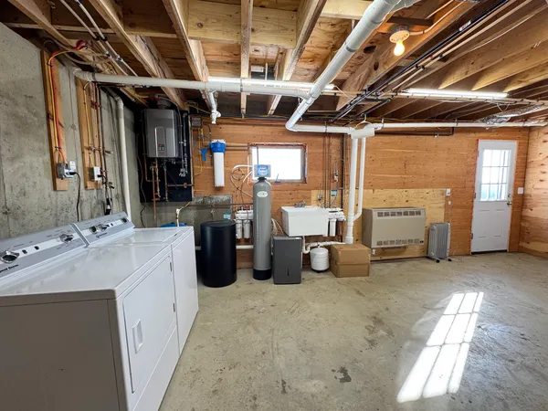 $899,000 | 203 East Shore Road, Embden, ME 04958