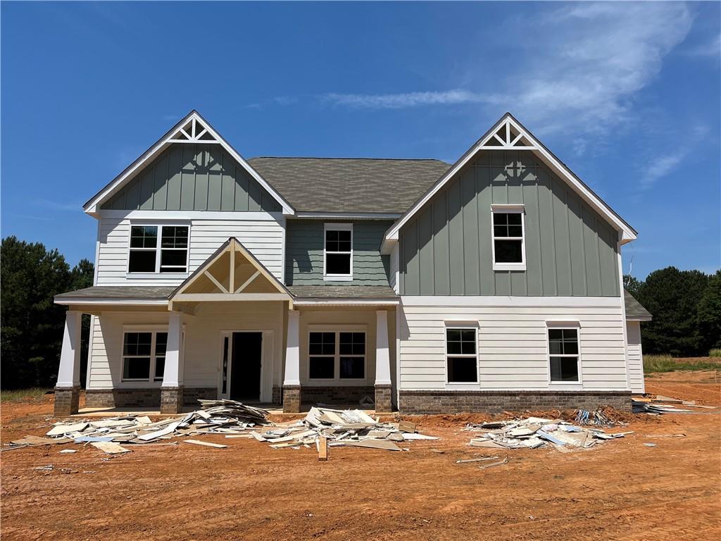 884 Cattle Barn Road Monroe, GA 30656 - Photo 1 of 1 a front view of a house with a yard