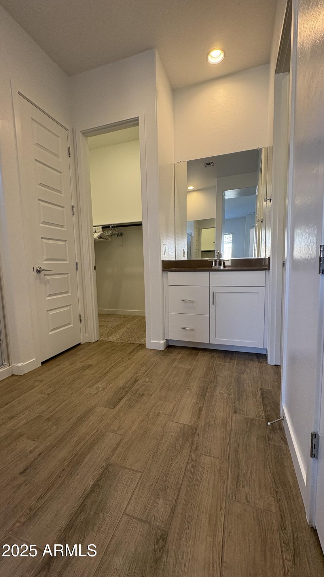 3240 West Peak View Road Phoenix, AZ 85083 - Photo 15 of 37 a bathroom with a sink and a mirror