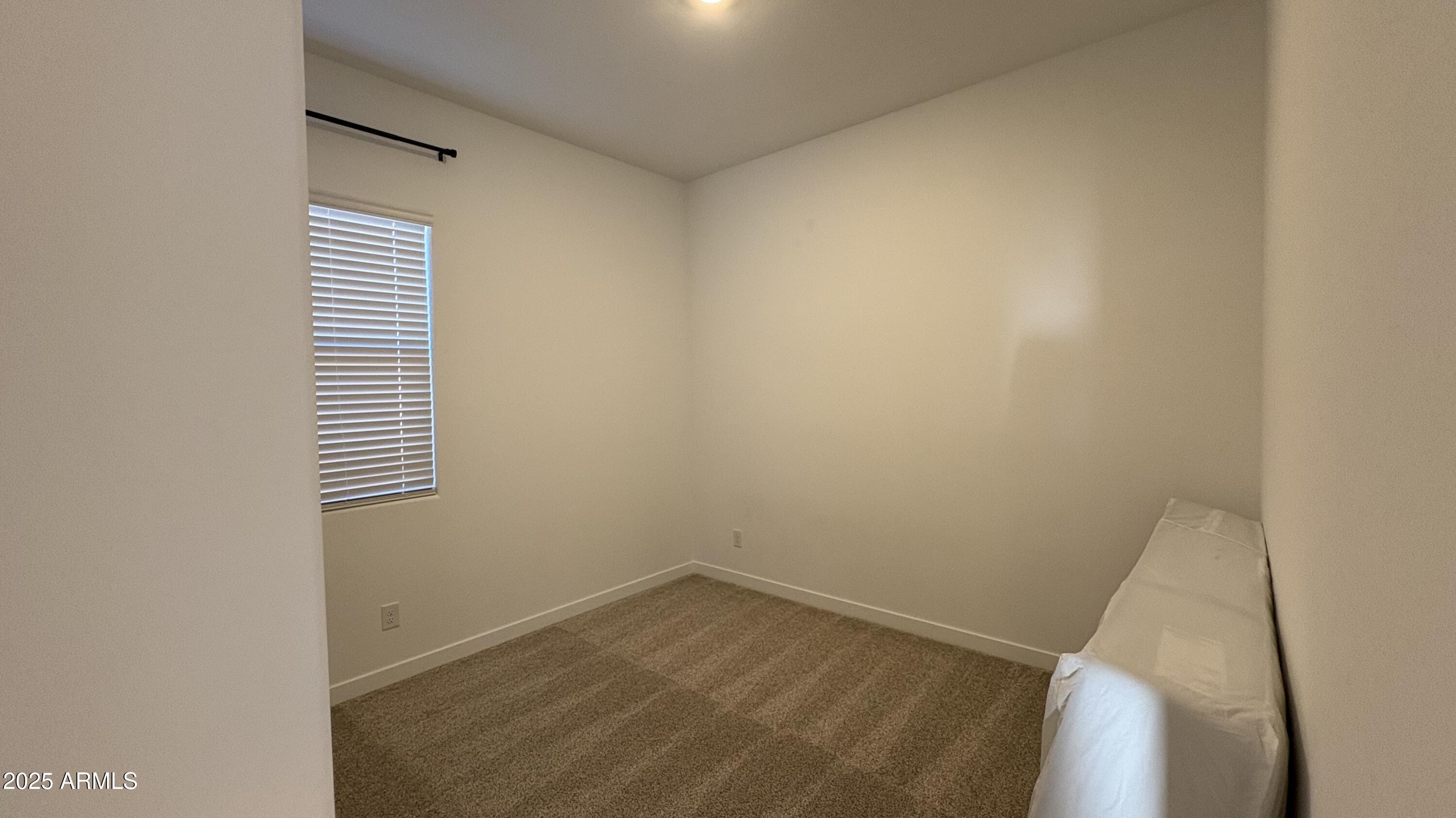 3240 West Peak View Road Phoenix, AZ 85083 - Photo 19 of 37 a view of a small space with a window